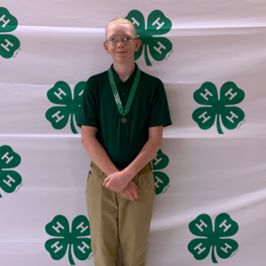 Aedan Smith wins a Silver Medal in the Forestry and Wildlife category with his presentation on Invasive Plants in the Croatan Forest